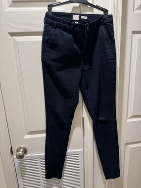 High-Rise Ankle Pants in Black by Unknown Brand